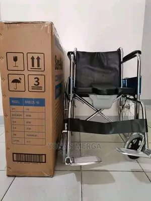 Photo - Commode Wheelchair Features Removable Commode Bucket