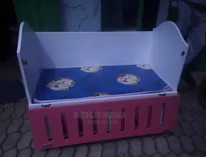 Photo - የልጅ አልጋ ከነፍራሹ