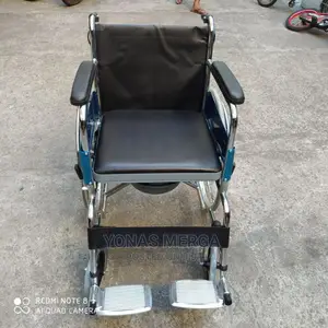 Photo - Transport Wheelchair With a Comfortable Removable Pad