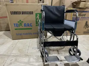 Photo - Commode Urinal Wheel Chair for the Elderly