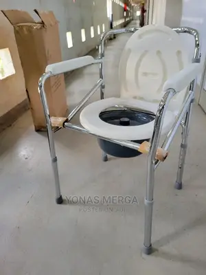 Photo - Commode Chair For
Bath Tub Stool,Folding Mobile Toilet
