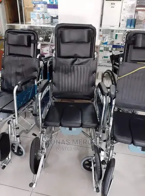 Photo - Foldable Reclining Wheelchair for Regular Commode Use
