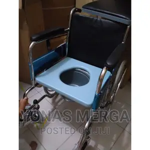 Photo - Wheelchair With Has Big Wheels With Hand Railings