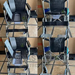 Wheelchair With Has Big Wheels With Hand Railings