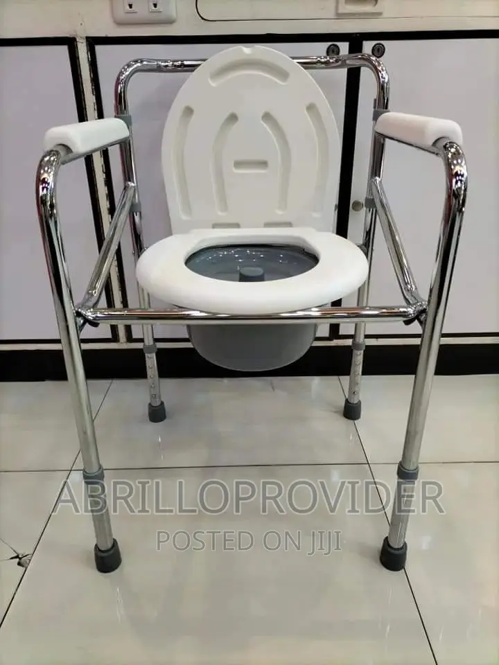 Adjustable Commode Chair New Packed