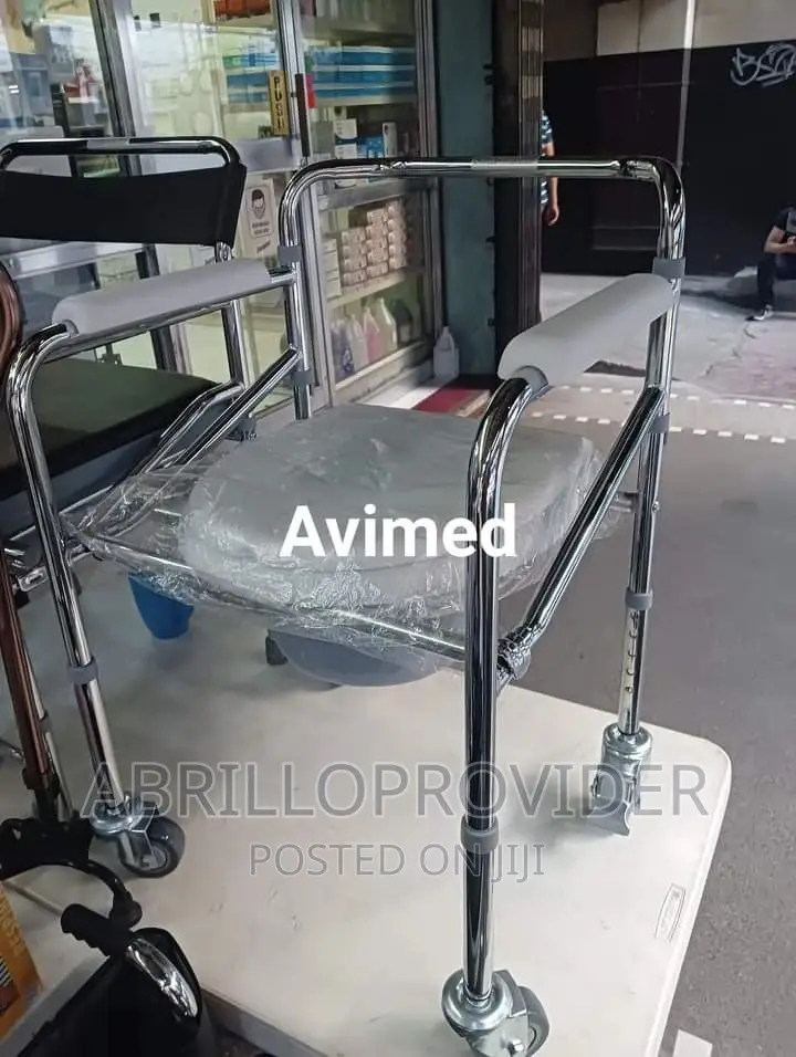 Commode Chair With Mag Wheel