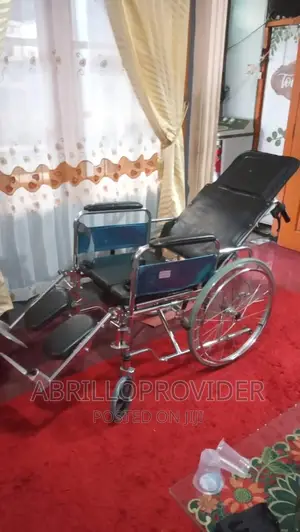 Photo - USED ALMUNIUM Multifunctional Wheelchair (Almost New )
