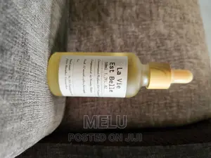 Photo - La Vie Est Belle Oil Perfume