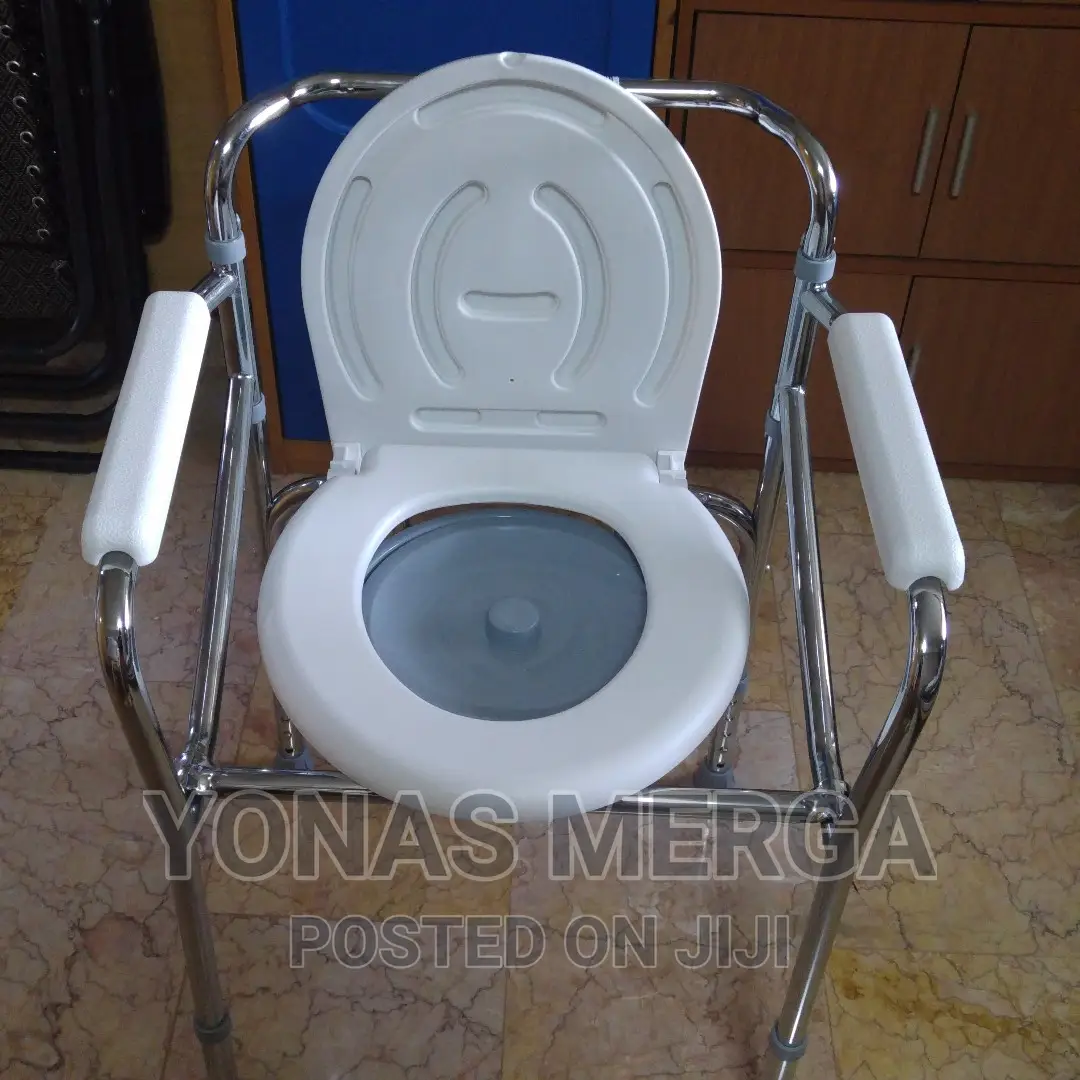 COMMODE HAS PLENTY OF CAPACITY With a Pail That Easily