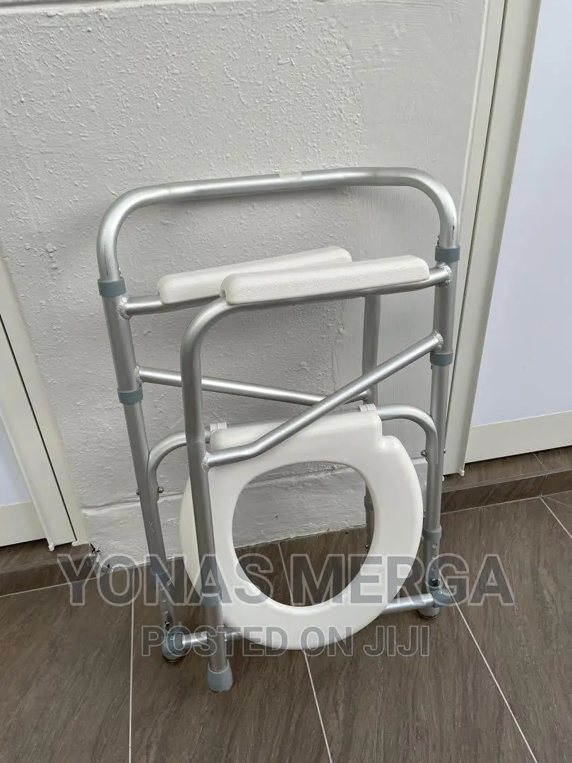 COMMODE HAS PLENTY OF CAPACITY With a Pail That Easily