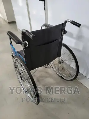 Used Wheelchair Controlling the Switch With One Hand