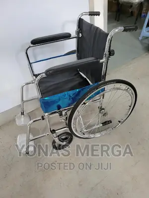 Photo - Used Wheelchair Controlling the Switch With One Hand