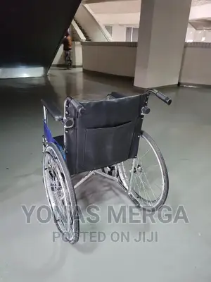 Photo - Suncare Aluminum Wheelchair With Flip Up Armrest