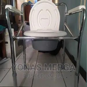 Photo - Commode Chair With Easy Storage Detachable Seat and Cover