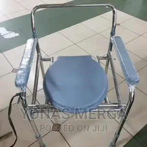 Photo - Commode Chair;Seat Is Made of High Quality Glossy Plastic