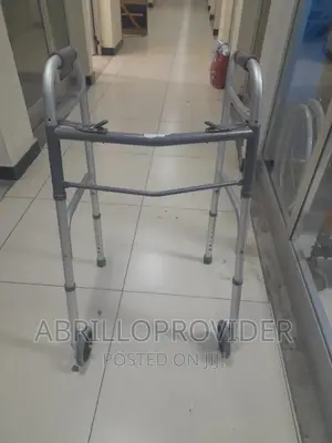 Photo - Used Walker Aid With Wheel