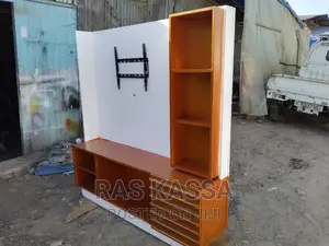 Photo - 55 ኢንች ቲቪ የሚይዝ ቲቪ ስታንድ