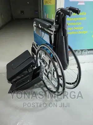 Photo - at Commode It’S Fully Made of Stainless Steel/Wheelchair