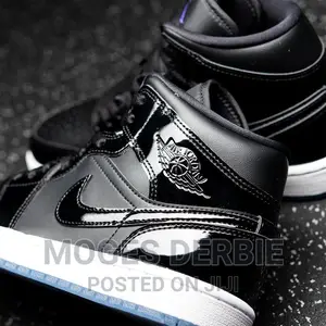 Photo - Jordan 1 Mid Space Jam