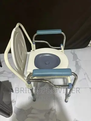 Commode Chair With Height Adjustment/Foldable COMMODE CHAIR