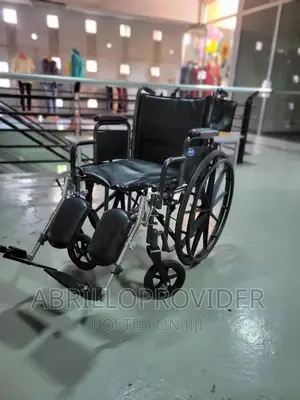Photo - Adjustable Leg Wheelchair