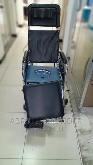 Photo - Slightly Used Wheelchair/Commode Wheelchair/Reclining Wheel