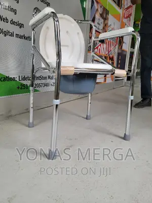 Photo - Hospital Bed With Mattress, Wheelchair/Commode
Chair/Commod