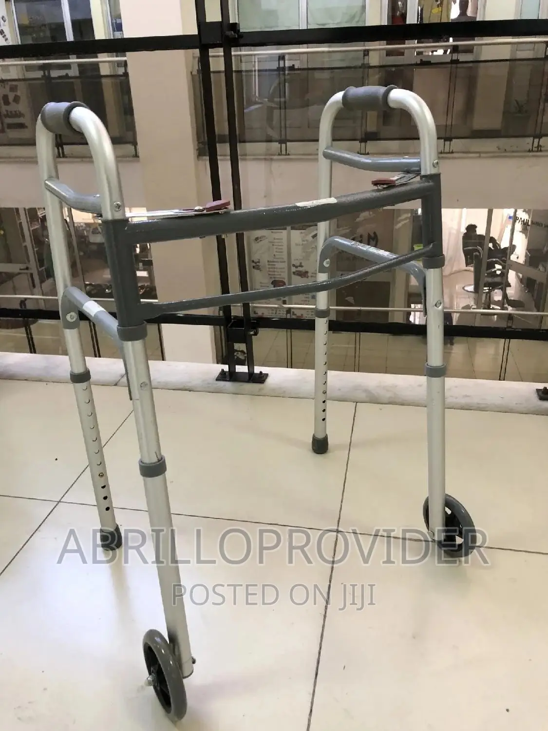 Drive Deluxe Folding Walker, Two Button With 5”Wheels.
