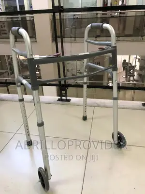 Drive Deluxe Folding Walker, Two Button With 5”Wheels.