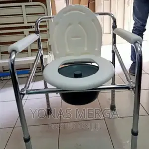 Photo - CURE-WELL Heavy Duty Bedside Commode Chair,Homecare