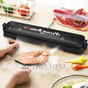 Photo - Automatic Vacuum Sealer Machine የላስቲክ ማሸጊያ
