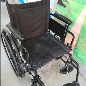 Wheelchair With Dual Axle Padded Flip Wheelchair