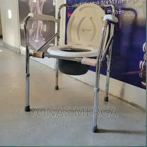 Photo - Commode//Max Weight Capacity 300lb (136.08 Kg)EVENLY DISTR