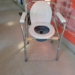 Photo - Commode Chair/ባለ ዘርፈ ብዙ ጥቅም ያለዉ የታማሚ የሽንት ቤት ወንበር