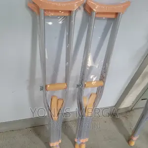 Photo - Crutches for the Disabled on Sliver Background.