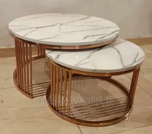 Photo - የመሀል ሴንተር ቴብል