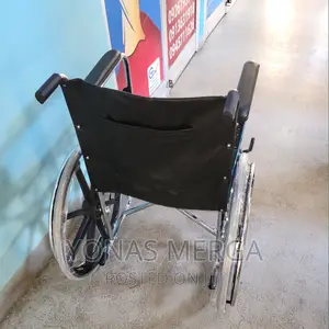 Wheelchair/Icare Folding Wheelchair Chrome With Mag Wheels