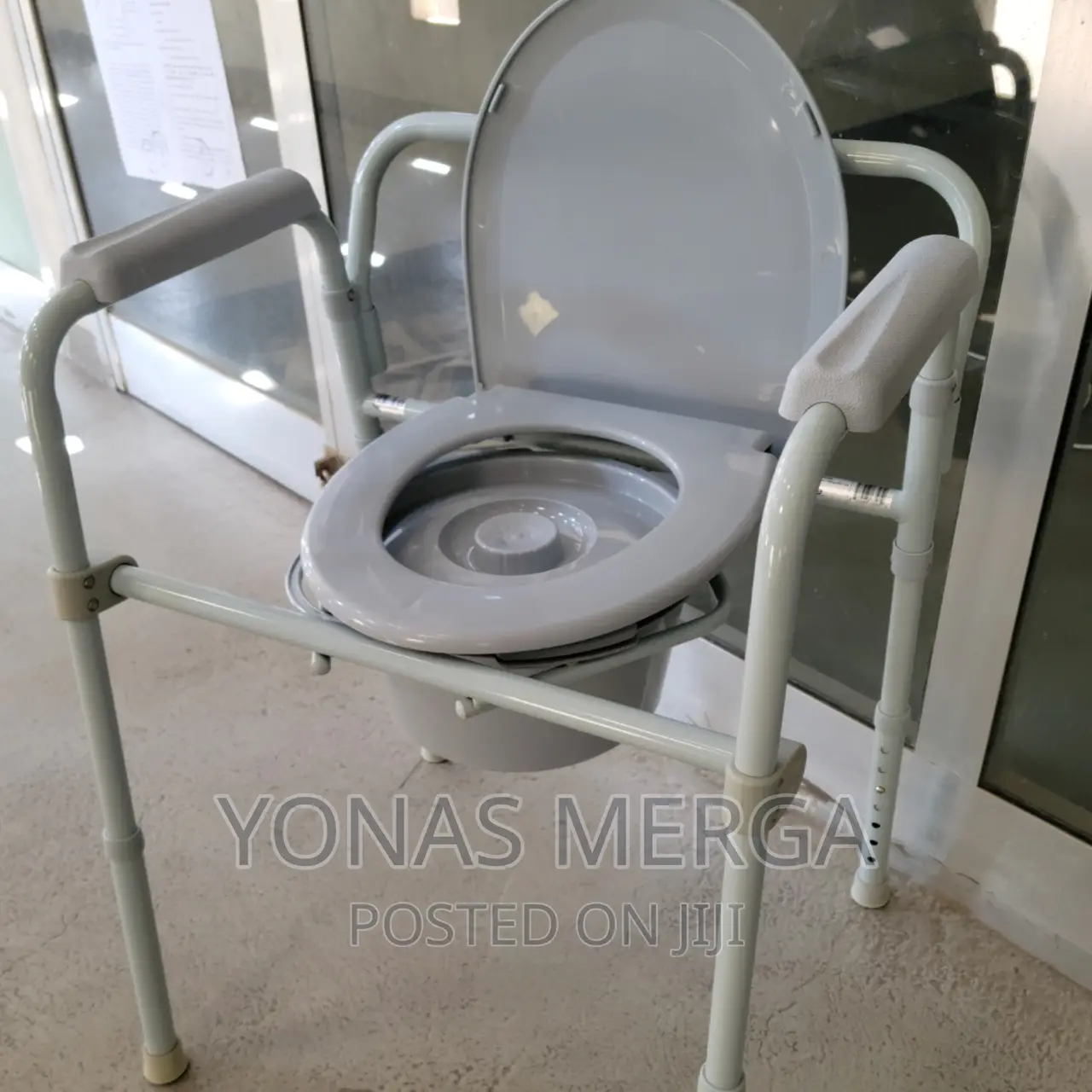 Swiftcomfort Adjustable Foldable Lightweight Toilet Chair"