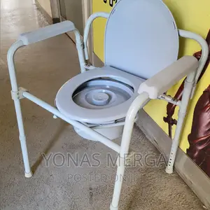 Photo - "Versatile Height-Adjustable Commode Toilet Shower Chair"
