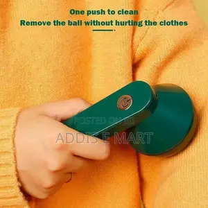 Photo - የተነጫጨ ልብስ ማደሻ Rechargeable Clothes Lint Remover