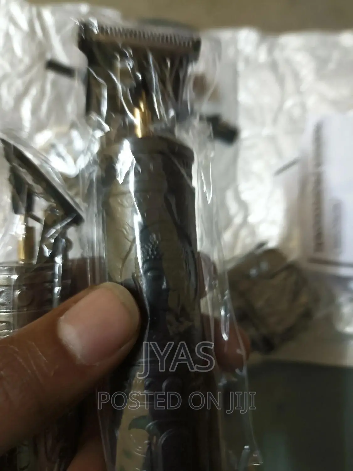 Rechargeable Hair Trimmer በቻርጅ የሚሰራ የፀጉር እና የፅኢም መቁረጫ