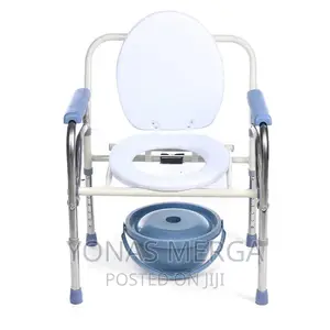 Photo - ኮሞድthis Commode Folds Easily for Storage and Transport.