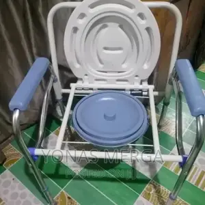 Photo - Drive Medical Steel Folding Deep Seat Bedside Commode, White