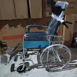 Photo - Wheelchair.-Adjustable Head Support Height and Angle: