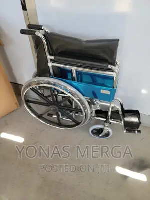 Wheelchair{Medical Depot Wheel Chair With Mag Wheels}