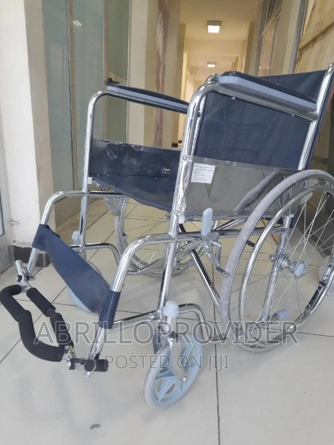 ንጹህ የሆነ አዲስ የሚባል Wheelchair=Almunium Wheelchair_