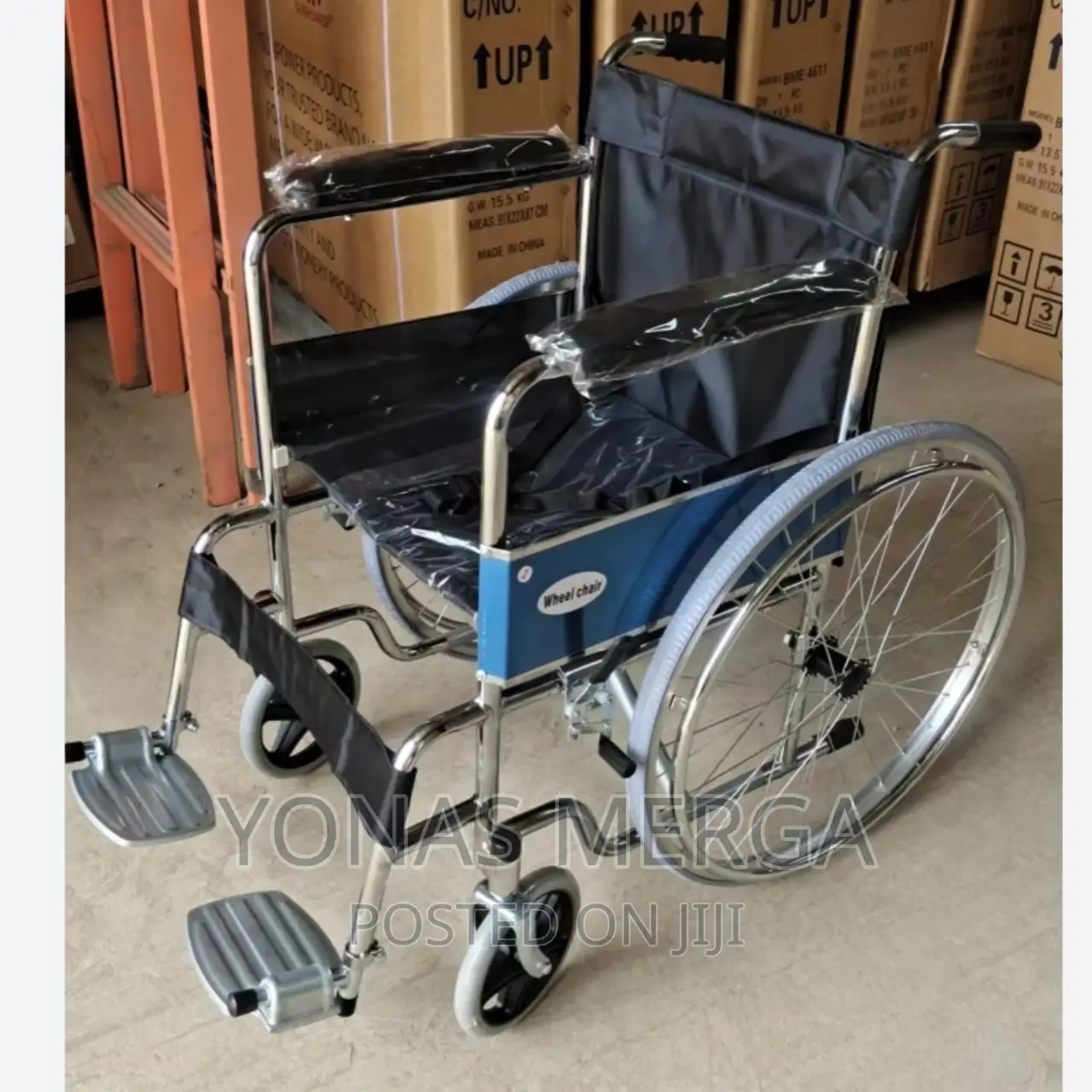 Wheelchair EASE TRANSPORTATION_ Wheelchair Folds on a Cross