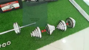 Photo - ዳምቤልና ባርቤል 50 Kg