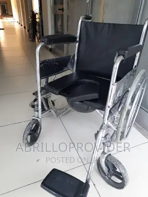 Photo - Removable Pedal and Pail Wheelchair/Commode Wheelchair