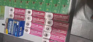 Photo - Neo Hair Lotion, Dermaroller